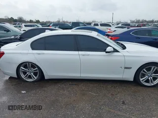 2015 BMW 7 Series 740Li with VIN WBAYE4C54FD947205, listed as a IAAI auction lot 41566291 with 172,729 mi miles and . Bid and sale history available at DreamBid. Image 13.
