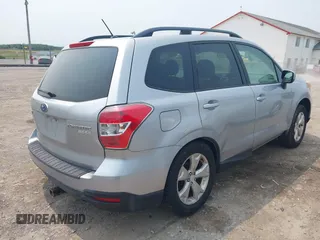 2014 Subaru Forester Premium with VIN JF2SJAEC7EH535318, listed as a IAAI auction lot 42370982 with 157,237 mi miles and . Bid and sale history available at DreamBid. Image 4.