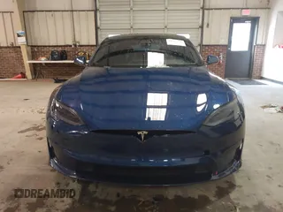2021 Tesla Model S Plaid with VIN 5YJSA1E6XMF439884, listed as a IAAI auction lot 41622750 with Not provided miles and . Bid and sale history available at DreamBid. Image 12.