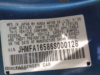2006 Honda Civic LX with VIN JHMFA16586S000128, listed as a IAAI auction lot 42138350 with 127,253 mi miles and . Bid and sale history available at DreamBid. Image 9.