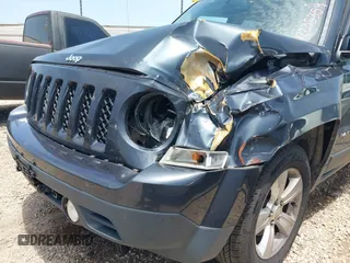 2014 Jeep Patriot Sport z VIN 1C4NJRBB0ED731291, wystawiony jako IAAI lot #42235359 z przebiegiem 119 271 mil mil oraz . Historia ofert i sprzedaży dostępna na DreamBid. Obrazek 6.