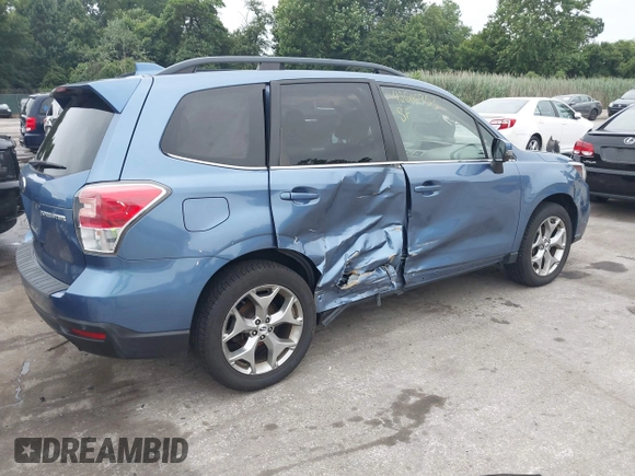 2018 Subaru Forester Touring with VIN JF2SJAWC6JH597365, listed as a IAAI auction lot 42606953 with 66,340 mi miles and . Bid and sale history available at DreamBid. Image 4.