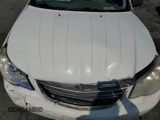 2009 Chrysler Sebring Limited with VIN 1C3LC56V39N566582, listed as a Copart auction lot 70522454 with 148,113 mi miles and Salvage Title. Bid and sale history available at carsss.com. Image 11.