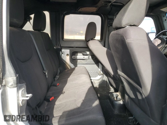 2015 Jeep Wrangler Unlimited Willys Wheeler with VIN 1C4BJWDG7FL690952, listed as a Copart auction lot 51493715 with 45,497 mi miles and Salvage Title. Bid and sale history available at DreamBid. Image 11.