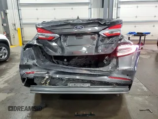 2019 Ford Fusion Hybrid SE with VIN 3FA6P0LU9KR287187, listed as a Copart auction lot 52704565 with 52,543 mi miles and Salvage Title. Bid and sale history available at carsss.com. Image 6.