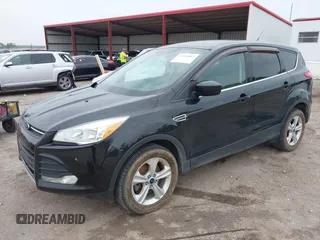 2014 Ford Escape SE with VIN 1FMCU9G96EUD61299, listed as a IAAI auction lot 42411069 with 147,957 mi miles and . Bid and sale history available at DreamBid. Image 2.
