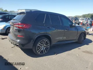 2020 BMW X5 M50i with VIN 5UXJU4C05LL228167, listed as a Copart auction lot 70390194 with Not Provided miles and Salvage Title. Bid and sale history available at DreamBid. Image 3.