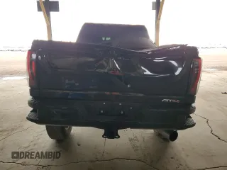 2025 GMC Sierra 2500HD AT4 z VIN 1GT4UPEY9SF116939, wystawiony jako Copart lot #55508755 z przebiegiem 13 602 mil mil oraz Szkoda całkowita • Salvage title. Historia ofert i sprzedaży dostępna na DreamBid. Obrazek 6.