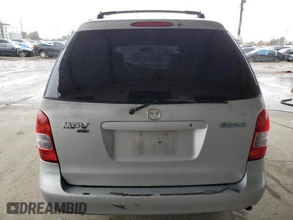 2000 Mazda MPV DX с VIN JM3LW28G7Y0129123, выставлен на аукционе Copart как лот 49331495 с пробегом 155 395 миль миль и Списание • Salvage title. История ставок и продаж доступна на DreamBid. Изображение 6.