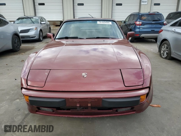 1984 Porsche 944 z VIN WP0AA0948EN461206, wystawiony jako Copart lot #79163494 z przebiegiem 15 862 mil mil oraz Szkoda całkowita • Salvage title. Historia ofert i sprzedaży dostępna na DreamBid. Obrazek 5.