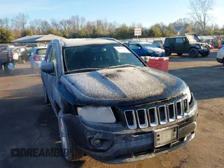 2012 Jeep Compass Latitude with VIN 1C4NJDEB5CD697957, listed as a IAAI auction lot 41807133 with 105,873 mi miles. Bid and sale history available at carsss.com. Image 1.
