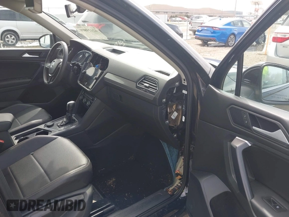 2021 Volkswagen Tiguan SE with VIN 3VV2B7AX4MM050282, listed as a IAAI auction lot 42124808 with 80,082 mi miles and . Bid and sale history available at DreamBid. Image 5.