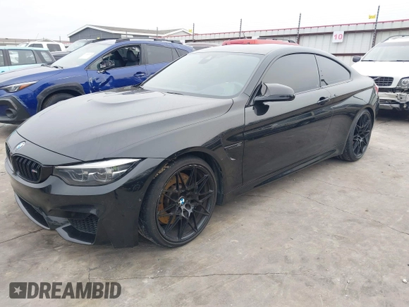 2019 BMW M4 with VIN WBS4Y9C53KAH82910, listed as a IAAI auction lot 41570315 with 59,227 mi miles. Bid and sale history available at carsss.com. Image 23.