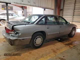 1996 Buick Regal Custom with VIN 2G4WB52KXT1523059, listed as a Copart auction lot 88440285 with 95,444 mi miles and Salvage title. Bid and sale history available at DreamBid. Image 3.