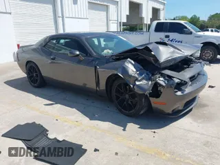 2015 Dodge Challenger SXT with VIN 2C3CDZAG1FH868874, listed as a IAAI auction lot 41883698 with 134,710 mi miles. Bid and sale history available at carsss.com. Image 1.