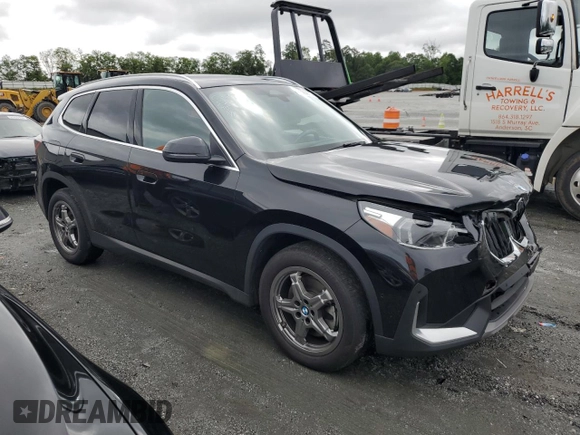 2023 BMW X1 xDrive28i with VIN WBX73EF09P5W64467, listed as a Copart auction lot 58586875 with 29,022 mi miles and Salvage title. Bid and sale history available at DreamBid. Image 4.