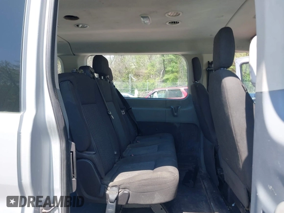 2016 Ford Transit Wagon XL with VIN 1FBZX2ZM8GKA69218, listed as a IAAI auction lot 42027106 with 311,419 mi miles. Bid and sale history available at carsss.com. Image 8.