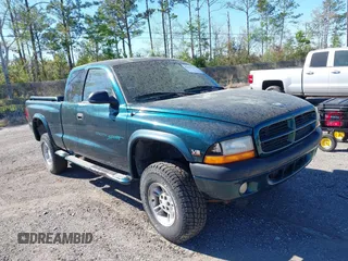 1998 Dodge Dakota SLT with VIN 1B7GG22Y0WS524464, listed as a IAAI auction lot 41806151 with 185,380 mi miles. Bid and sale history available at carsss.com. Image 1.