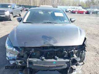 2017 Mazda 3 Touring z VIN 3MZBN1V70HM130081, wystawiony jako IAAI lot #42091430 z przebiegiem 114 480 mil mil oraz . Historia ofert i sprzedaży dostępna na DreamBid. Obrazek 6.