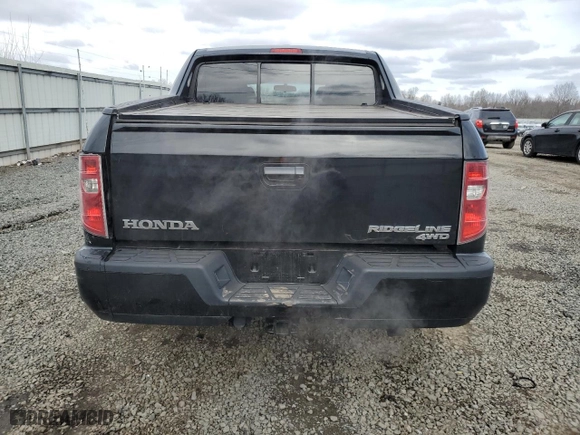 2010 Honda Ridgeline RTL with VIN 5FPYK1F57AB010749, listed as a Copart auction lot 45884225 with 165,016 mi miles and Salvage Title. Bid and sale history available at carsss.com. Image 6.