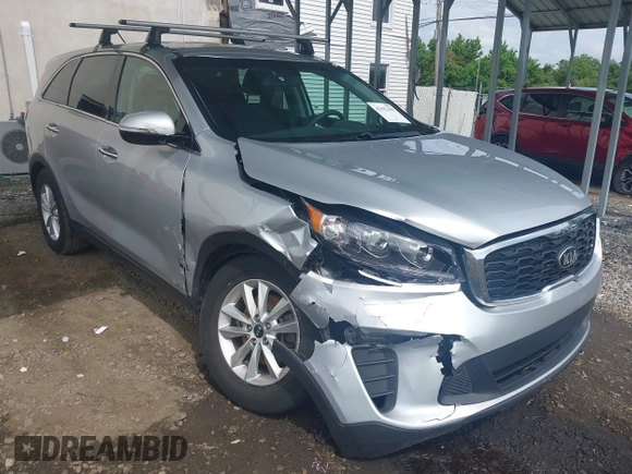 2019 Kia Sorento LX z VIN 5XYPGDA58KG482726, wystawiony jako IAAI lot #42192199 z przebiegiem 79 545 mil mil oraz . Historia ofert i sprzedaży dostępna na DreamBid. Obrazek 1.
