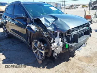 2019 Hyundai Kona Limited with VIN KM8K33A57KU223932, listed as a IAAI auction lot 41869416 with 102,424 mi miles. Bid and sale history available at carsss.com. Image 6.