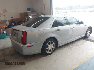 2011 Cadillac STS RWD with VIN 1G6DW6ED4B0120517, listed as a IAAI auction lot 41765069 with 120,059 mi miles and . Bid and sale history available at DreamBid. Image 4.