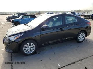 2022 Hyundai Accent SEL with VIN 3KPC24A61NE182565, listed as a Copart auction lot 67732004 with 26,799 mi miles and Salvage Title. Bid and sale history available at DreamBid. Image 1.