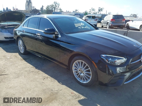 2021 Mercedes-Benz E-Class E 350 with VIN W1KZF8DB0MA889890, listed as a IAAI auction lot 41317094 with 63,075 mi miles. Bid and sale history available at carsss.com. Image 1.