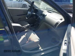 2003 Nissan Maxima SE z VIN JN1DA31D03T516575, wystawiony jako IAAI lot #42153623 z przebiegiem 176 446 mil mil oraz . Historia ofert i sprzedaży dostępna na DreamBid. Obrazek 5.