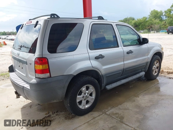 2006 Ford Escape XLT z VIN 1FMYU03106KD36056, wystawiony jako IAAI lot #42806356 z przebiegiem 175 183 mil mil oraz . Historia ofert i sprzedaży dostępna na DreamBid. Obrazek 4.