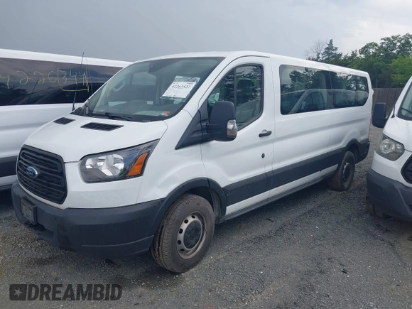 2019 Ford Transit Passenger XL z VIN 1FBZX2ZM8KKA34929, wystawiony jako IAAI lot #42263522 z przebiegiem 376 862 mil mil oraz . Historia ofert i sprzedaży dostępna na DreamBid. Obrazek 14.