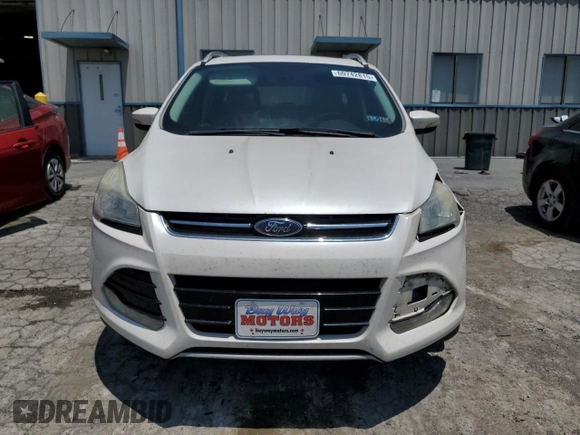 2016 Ford Escape Titanium with VIN 1FMCU9J96GUA48071, listed as a Copart auction lot 60742815 with 193,100 mi miles and Salvage title. Bid and sale history available at DreamBid. Image 5.