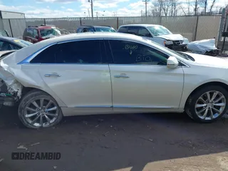 2014 Cadillac XTS Premium with VIN 2G61P5S38E9124277, listed as a IAAI auction lot 41744734 with 136,223 mi miles. Bid and sale history available at carsss.com. Image 13.