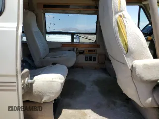 1994 GMC Vandura z VIN 1GDEG25K4RF512695, wystawiony jako Copart lot #63562414 z przebiegiem 171 855 mil mil oraz Szkody całkowita. Historia ofert i sprzedaży dostępna na DreamBid. Obrazek 11.