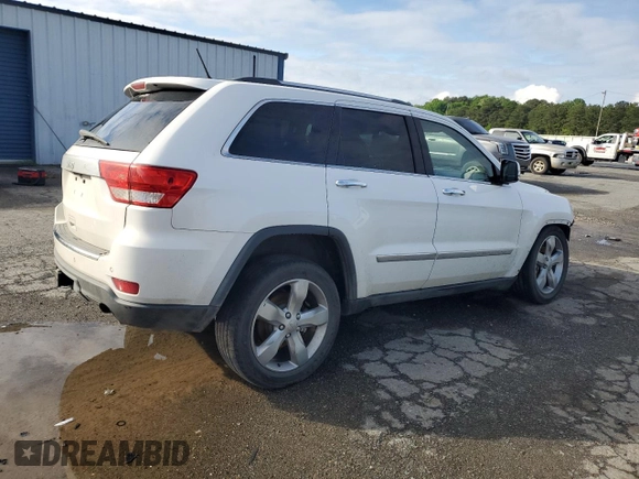 2013 Jeep Grand Cherokee Overland with VIN 1C4RJECG8DC526150, listed as a Copart auction lot 52038775 with 183,813 mi miles and Salvage Title. Bid and sale history available at DreamBid. Image 3.