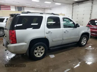 2011 GMC Yukon SLE with VIN 1GKS2AE0XBR195819, listed as a Copart auction lot 42131935 with 221,323 mi miles and Clean Title. Bid and sale history available at carsss.com. Image 3.