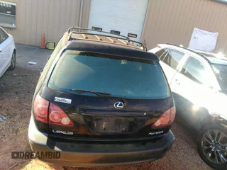 1999 Lexus RX 300 Luxury SUV with VIN JT6HF10U7X0038014, listed as a IAAI auction lot 41244208 with 183,823 mi miles. Bid and sale history available at carsss.com. Image 12.