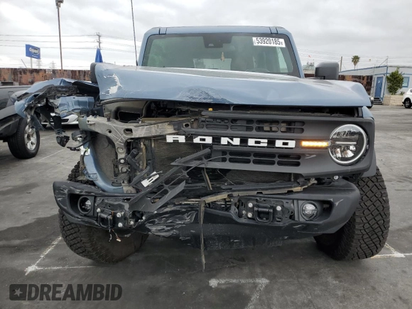 2024 Ford Bronco with VIN 1FMEE1BP6RLA41845, listed as a Copart auction lot 53920185 with 7,406 mi miles and Salvage title. Bid and sale history available at DreamBid. Image 5.