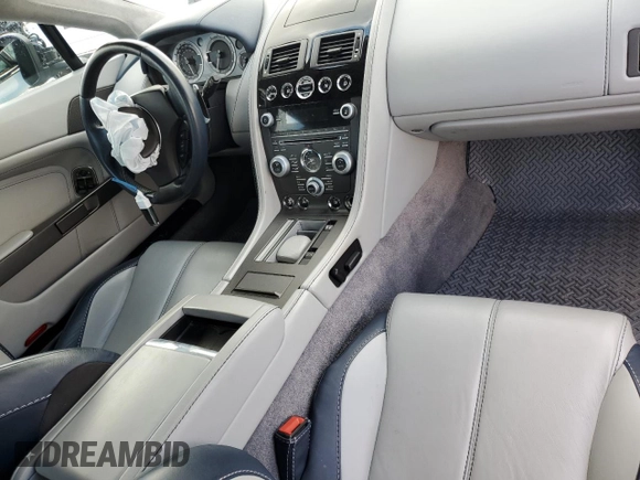 2015 Aston Martin Vantage z VIN SCFEKBAK2FGC19462, wystawiony jako Copart lot #61093934 z przebiegiem 53 068 mil mil oraz Szkoda całkowita • Salvage title. Historia ofert i sprzedaży dostępna na DreamBid. Obrazek 8.