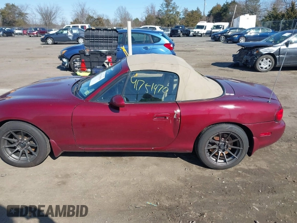 2003 Mazda MX-5 Miata Cloth with VIN JM1NB353730302782, listed as a IAAI auction lot 41751970 with 109,336 mi miles and . Bid and sale history available at DreamBid. Image 14.
