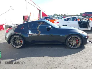 2013 Nissan 370Z with VIN JN1AZ4EH1DM880739, listed as a IAAI auction lot 40474120 with 76,369 mi miles. Bid and sale history available at carsss.com. Image 13.