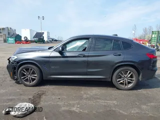 2021 BMW X4 xDrive30i z VIN 5UX2V1C02M9G88260, wystawiony jako IAAI lot #41991270 z przebiegiem 48 817 mil mil oraz . Historia ofert i sprzedaży dostępna na DreamBid. Obrazek 14.