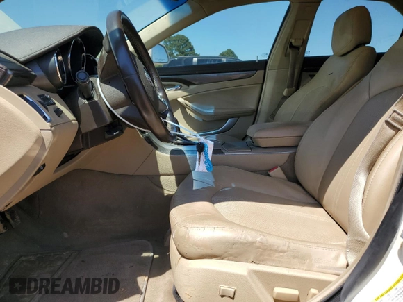 2013 Cadillac CTS Luxury with VIN 1G6DE5E59D0147205, listed as a Copart auction lot 52971005 with 180,291 mi miles and Salvage title. Bid and sale history available at DreamBid. Image 7.