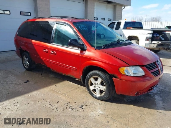 2005 Dodge Grand Caravan with VIN 2D4G944L75R310409, listed as a IAAI auction lot 41781132 with 128,120 mi miles and . Bid and sale history available at DreamBid. Image 1.