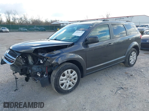 2017 Dodge Journey SE with VIN 3C4PDCAB0HT701477, listed as a IAAI auction lot 42025733 with 168,269 mi miles and . Bid and sale history available at DreamBid. Image 2.