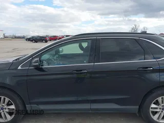 2015 Ford Edge SEL with VIN 2FMTK3J94FBB47320, listed as a IAAI auction lot 41982477 with 136,005 mi miles. Bid and sale history available at carsss.com. Image 14.
