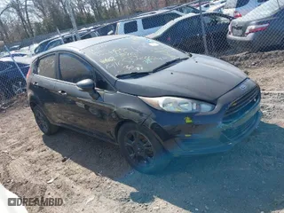 2015 Ford Fiesta SE with VIN 3FADP4EJ2FM217325, listed as a IAAI auction lot 41804096 with 999,999 mi miles. Bid and sale history available at carsss.com. Image 1.