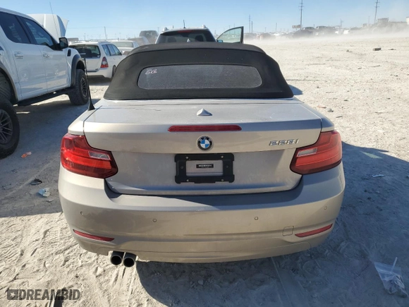 2015 BMW 2 Series 228i with VIN WBA1K5C54FV242897, listed as a Copart auction lot 89165755 with 37,100 mi miles and Salvage Title. Bid and sale history available at carsss.com. Image 6.