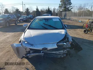 2020 Toyota Prius LE with VIN JTDL9RFU5L3013217, listed as a IAAI auction lot 41650064 with 124,704 mi miles and . Bid and sale history available at DreamBid. Image 13.